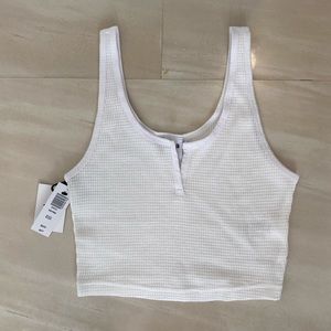 White TNA Notched Crop Top.